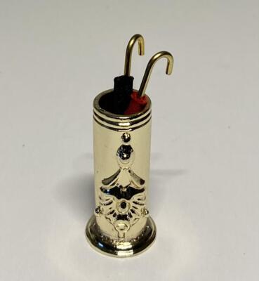 Paraplystander med paraplyer