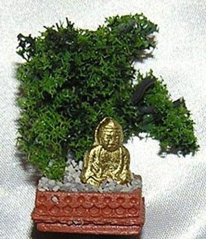 Buddha med bonsai