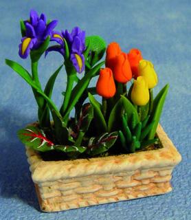 Krukke med iris og tulipaner